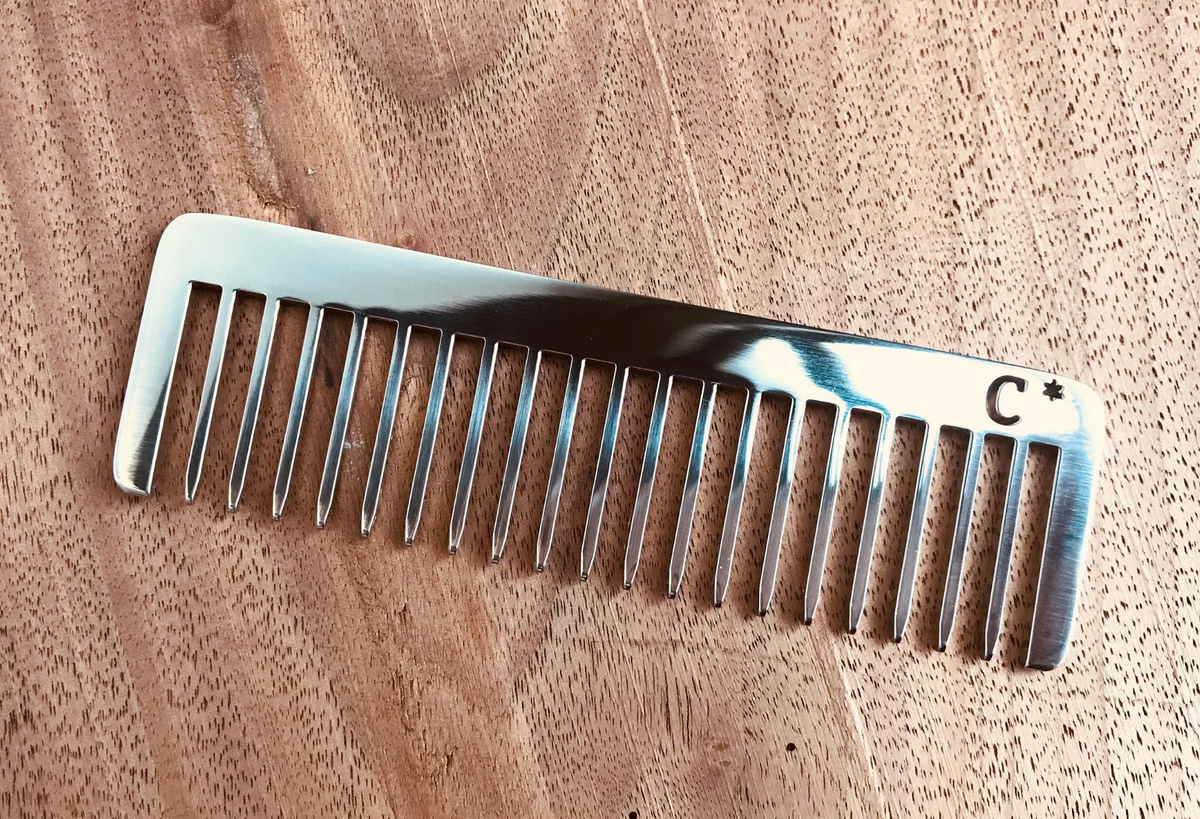 Metal best sale tooth comb